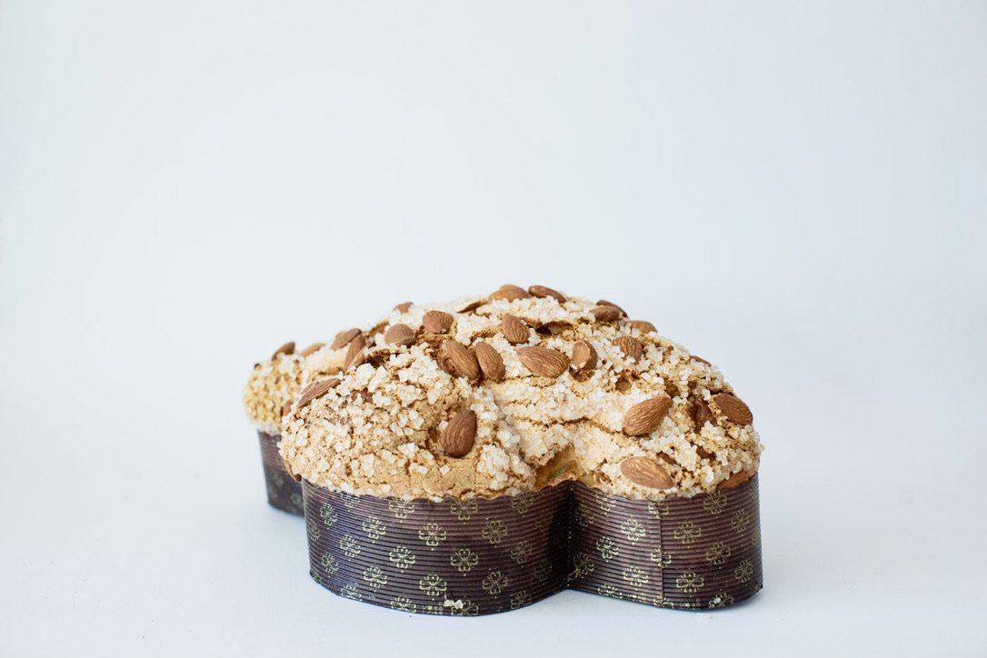 Colomba Artigianale (Spedizioni ๐) Colomba Artigianale Ottagono - Pasticceria dal 1983 Colomba artigianale con mandorle di Avola e farcita con canditi e scorzetta d'arancia mascalucia_catania_vendita_online